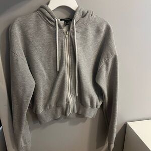 Dark grey string hoodie sweater with no pockets